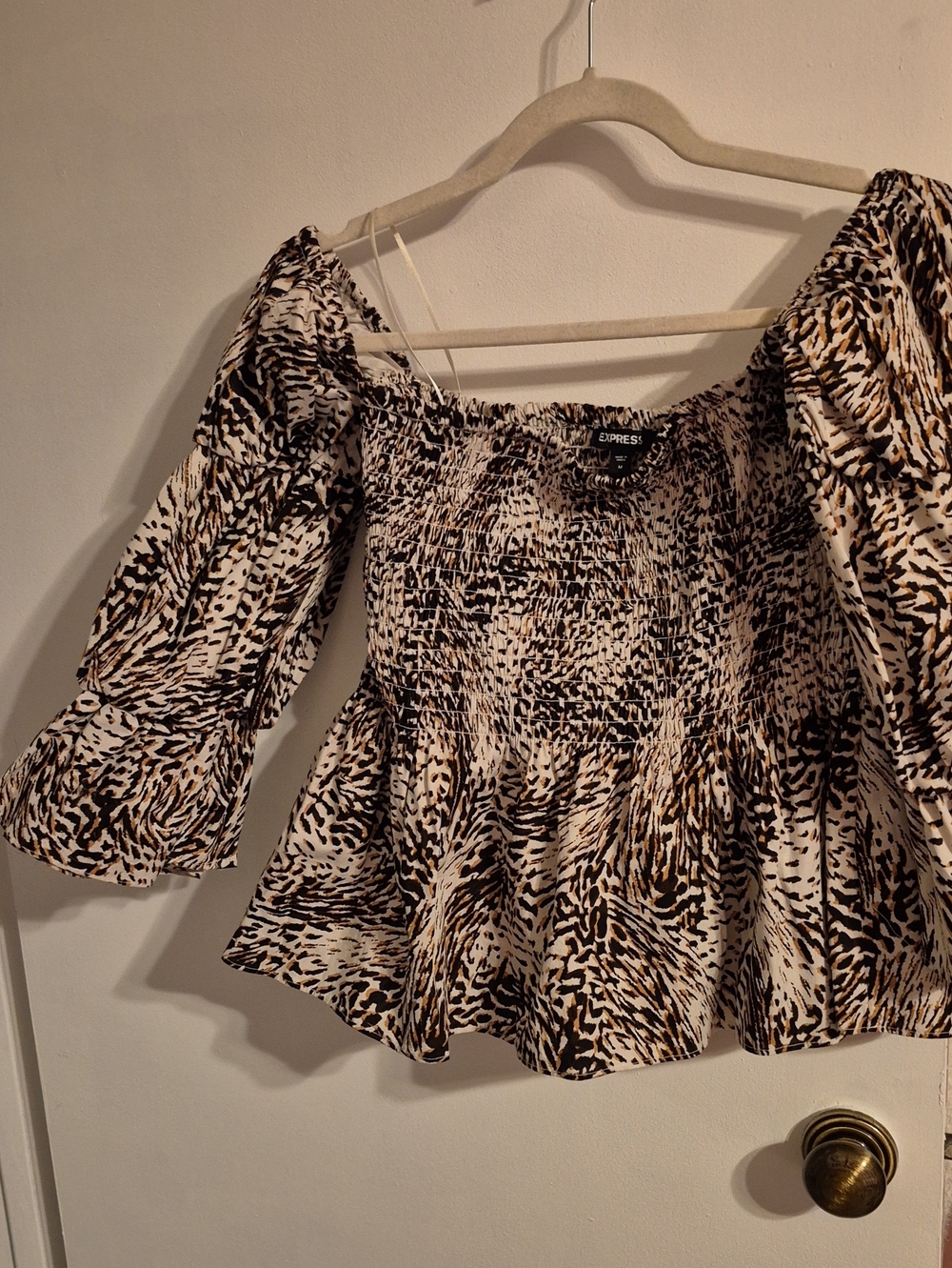 Express Off-Shoulder Smocked Peplum Top in Beige and Black Animal Print
